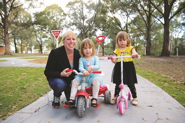 Mayor Byrne pictured with her daughers Maddison and Alexis at the new learn-to-ride at Crestwood Reserve