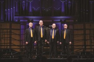 HighJacked Harmony Quartet performing on stage during the competition in the magnificent Adelaide Town Hall