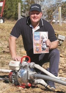 Aussie Pumps’ Brad Farrugia with the famous Fire Chief and the comprehensive Bushfire Survival Guide.