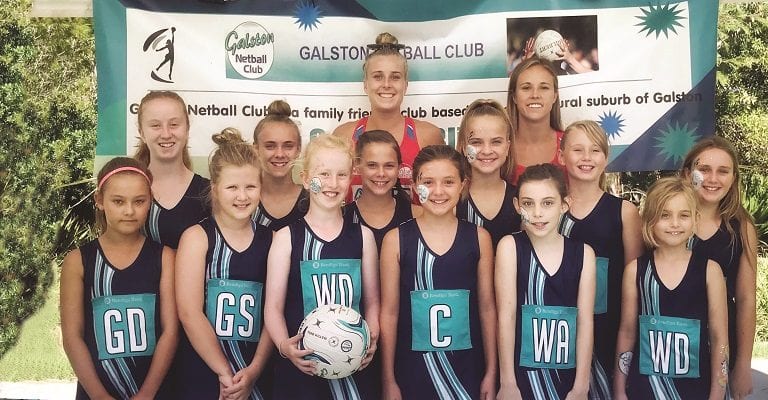 Players with Maddy and Paige