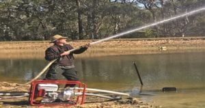 Steve Bonney checks out the performance of the Aussie Mr T Twin impeller fire pump at Fiddletown NSW