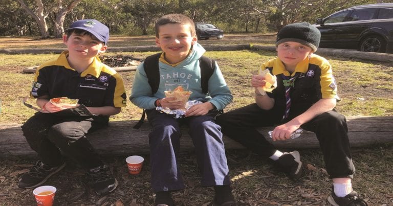 Cub Scouts Elijah Dawson Lachlan Aviani and Nash McGhie planning their next adventure.