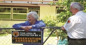 Esme at her front gate during the Voluntary Conservation Agreement celebration