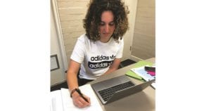 Year 12 student Teigan Elkhazen makes the transition to learning from home.