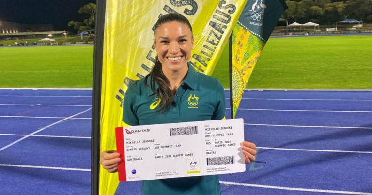 MICHELLE JENNEKE WITH HER PARIS TICKET0