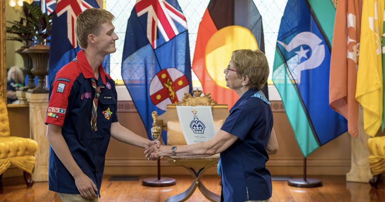 Margaret Beazley, Governor of NSW and Chief Scout of NSW, presents the King's Scout Award to Owen Cameron-