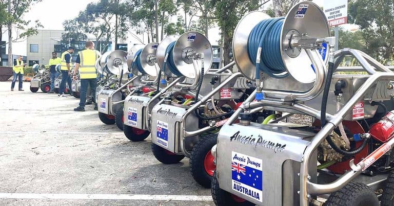 Australian-made industrial water pumps displayed outdoors for export.