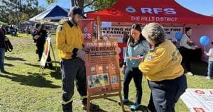 Fire Ready Challenge event with emergency services and community members in The Hills District.